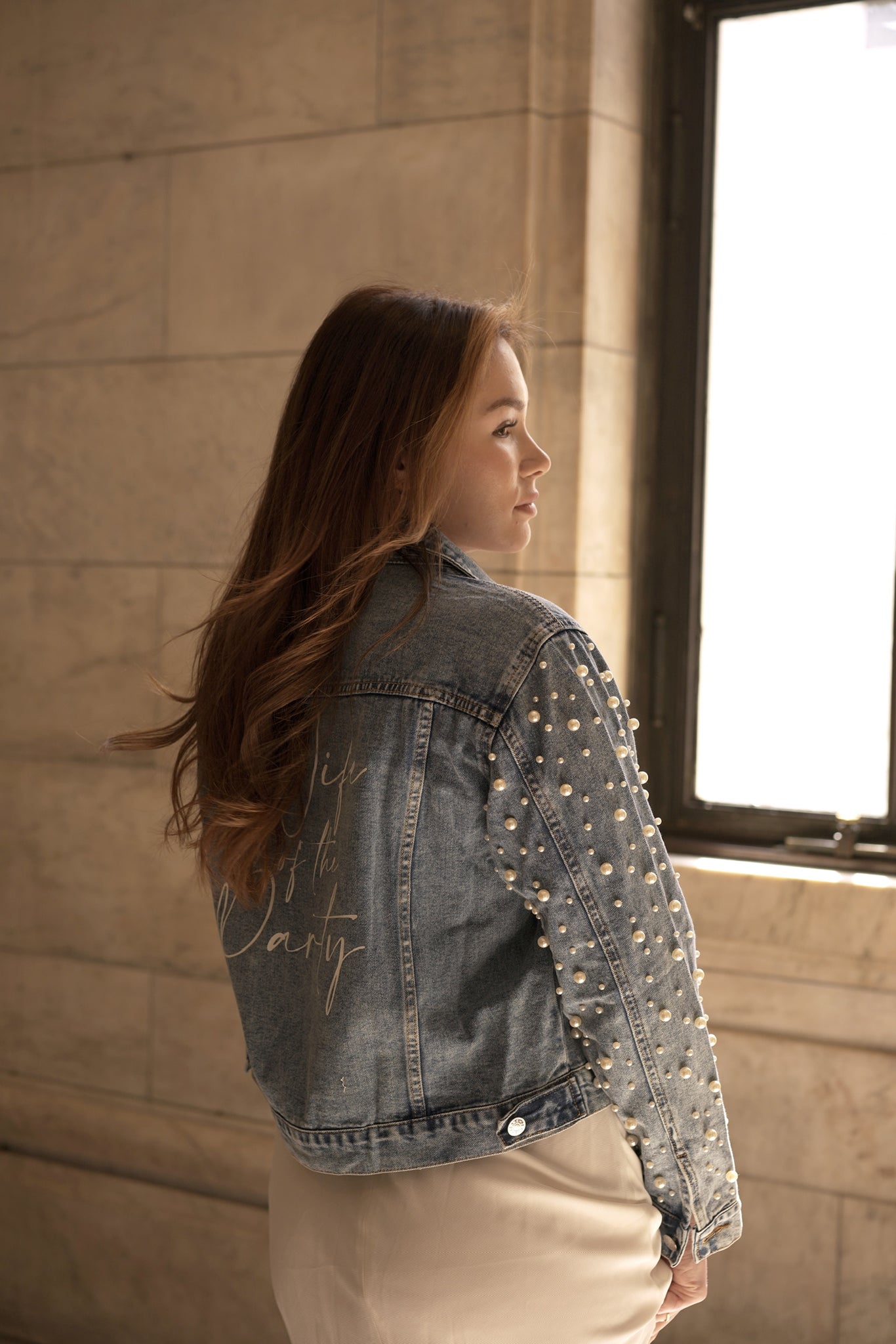 bridal denim jacket with pearls on the sleeves and wife of the party on the personalization.