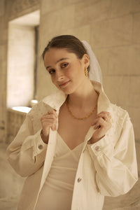 Front side of white pearl denim bride jacket