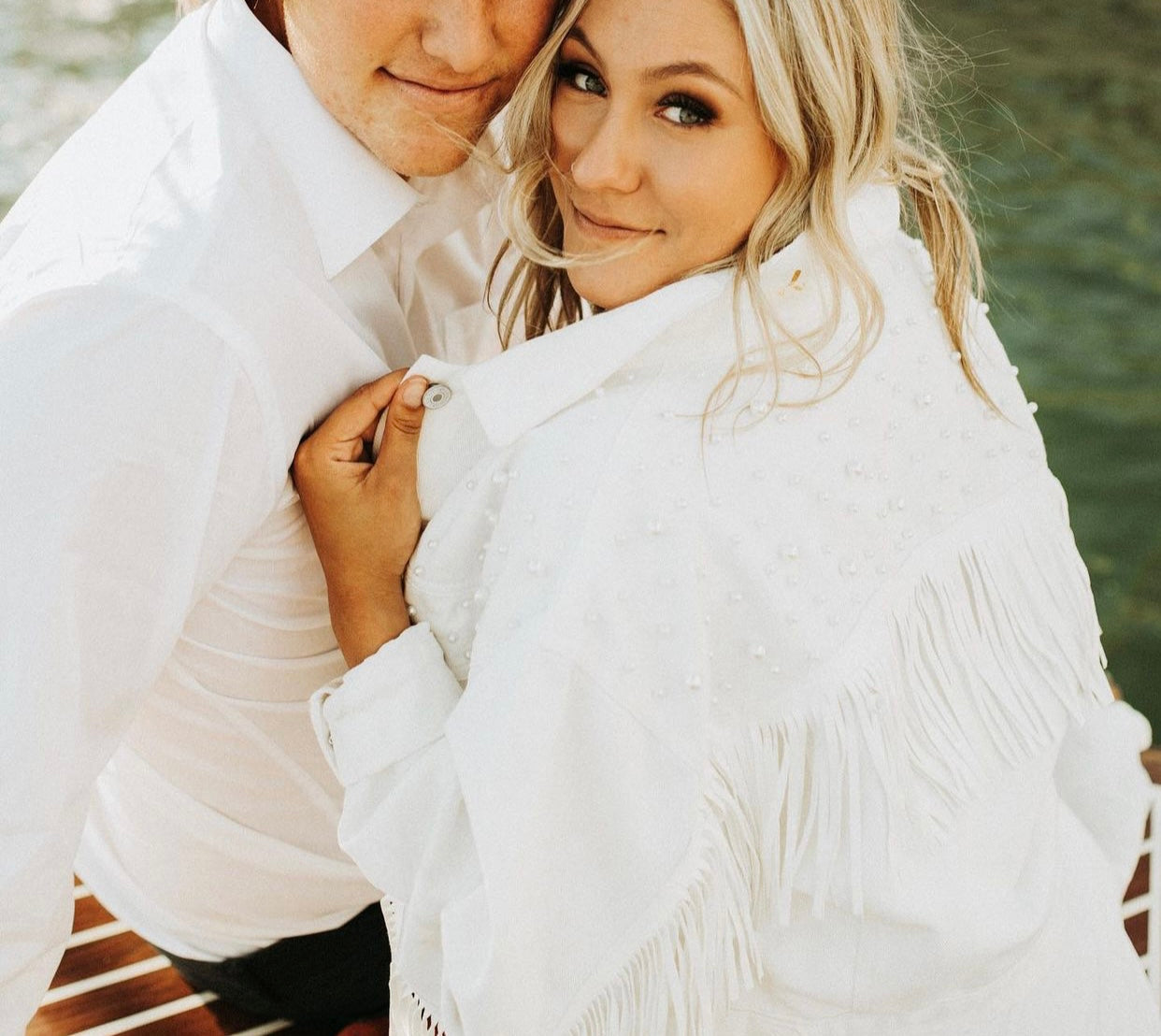 Pearl and fringe white cropped bride jacket.