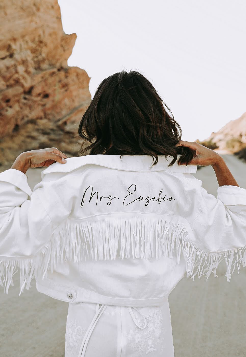 White fringe bride jacket with future last name on the back 