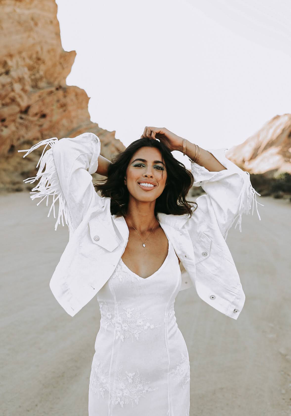 Front of custom denim bride jacket in white