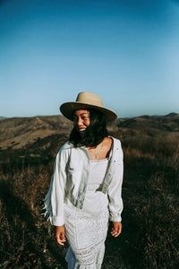 Front of white fringe denim jacket.